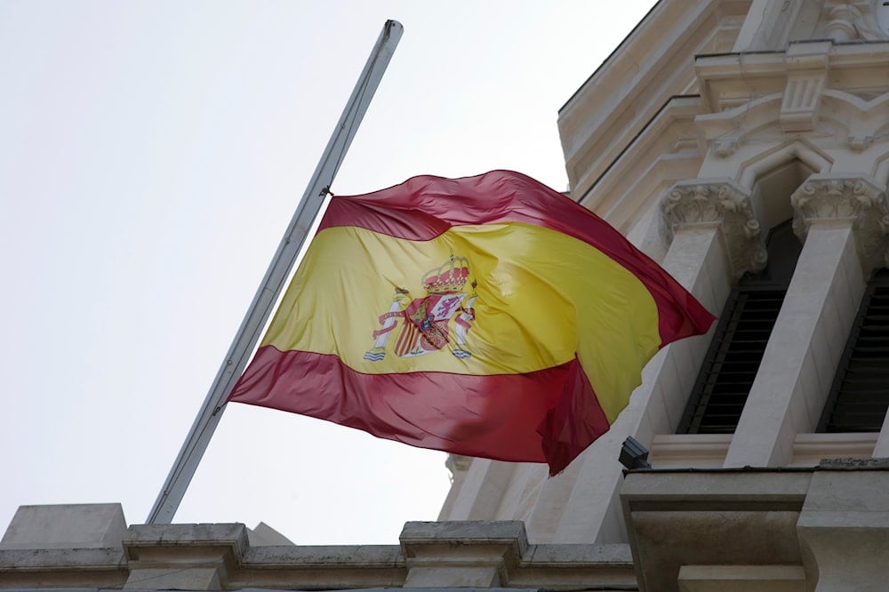 A Spanish flag flies at half-staff on the roof of the City Hall in Madrid, Spain, on May 23, 2017. (AP)