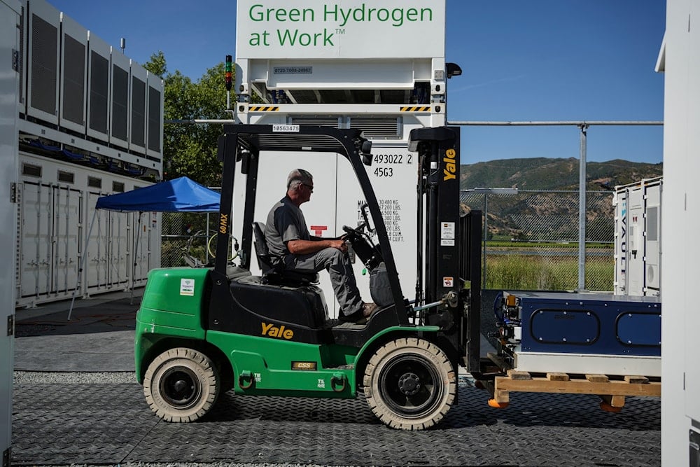 An employee drives a forklift at Energy Vault, a company that is creating an emergency power system that relies on hydrogen and battery storage, on Tuesday, May 27, 2025, in Calistoga, Calif (AP)