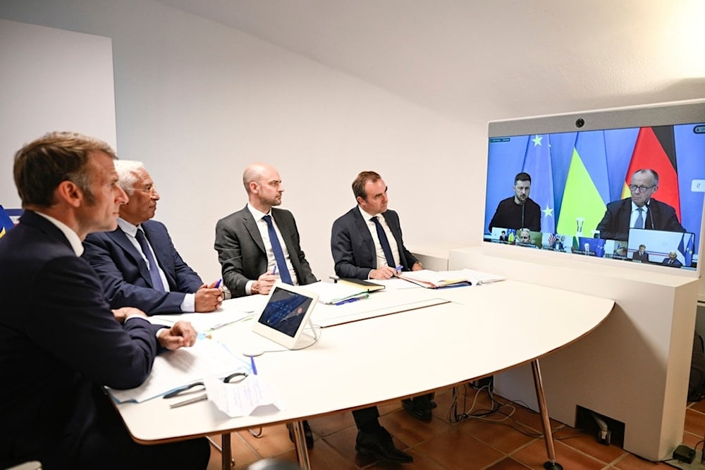 French President Emmanuel Macron attends a video conference on Ukraine at the Fort de Bregancon in Bormes-les-Mimosas, southern France, Wednesday, August 13, 2025 (AP)