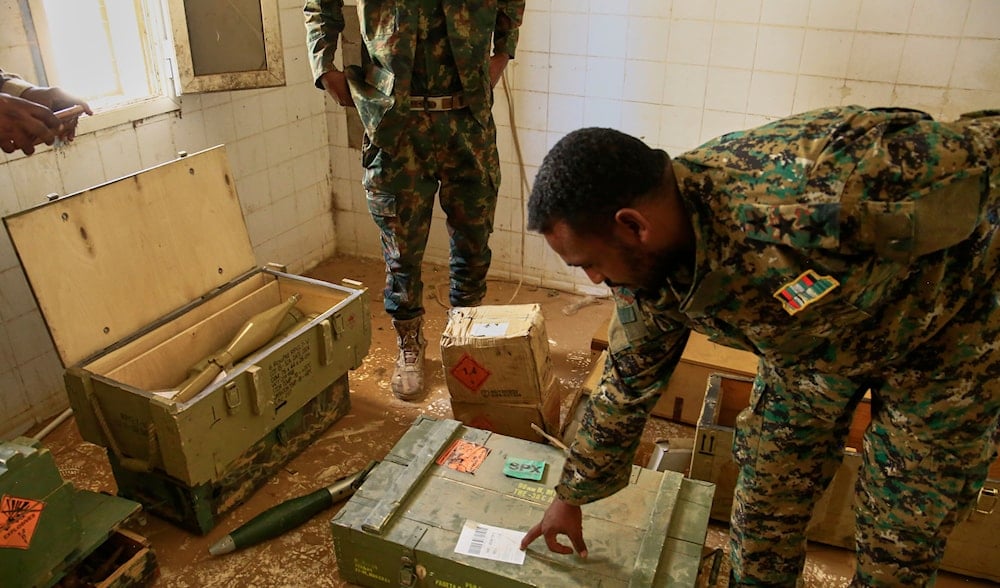 Sudanese army officers inspect a recently discovered weapons storage site belonging to the paramilitary Rapid Support Forces (RSF) in Khartoum, Sudan, Saturday, May 3, 2025. (AP)