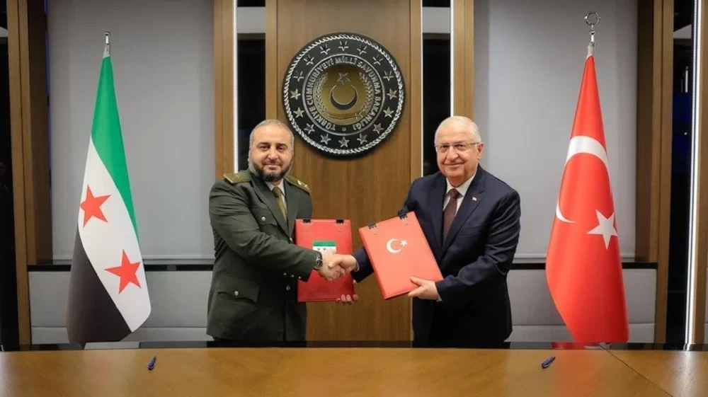 Syrian Defense Minister Murhaf Abu Qasra and Turkish Defense Minister Yasar Guler on August 13, 2025 (Syrian Defense Ministry)