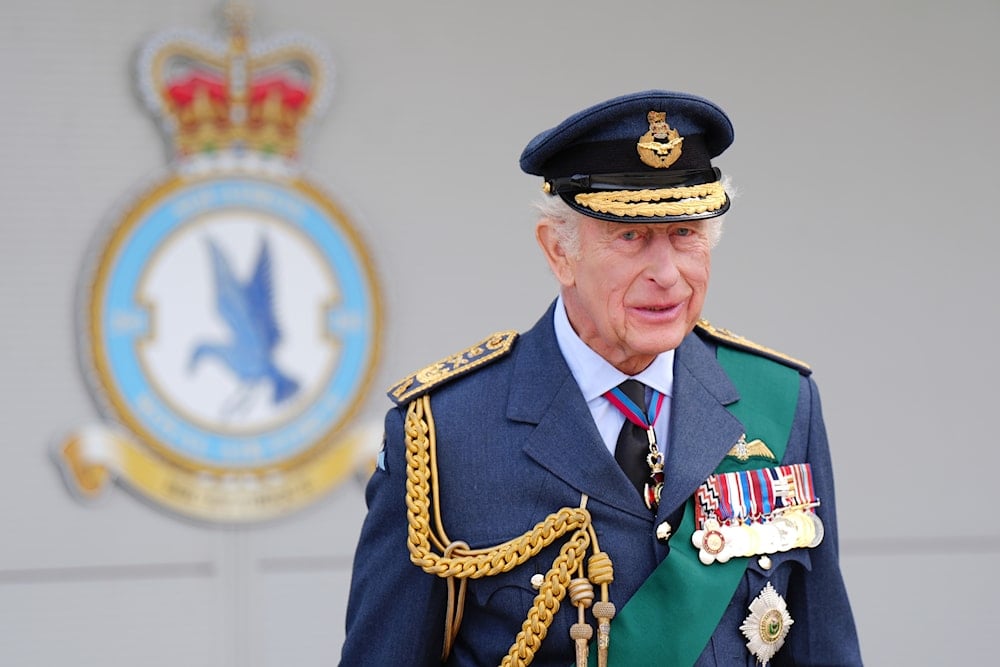 Britain's King Charles arrives to visit RAF Lossiemouth in Moray, Scotland, on August 6, 2025. (Jane Barlow/PA via AP, Pool)