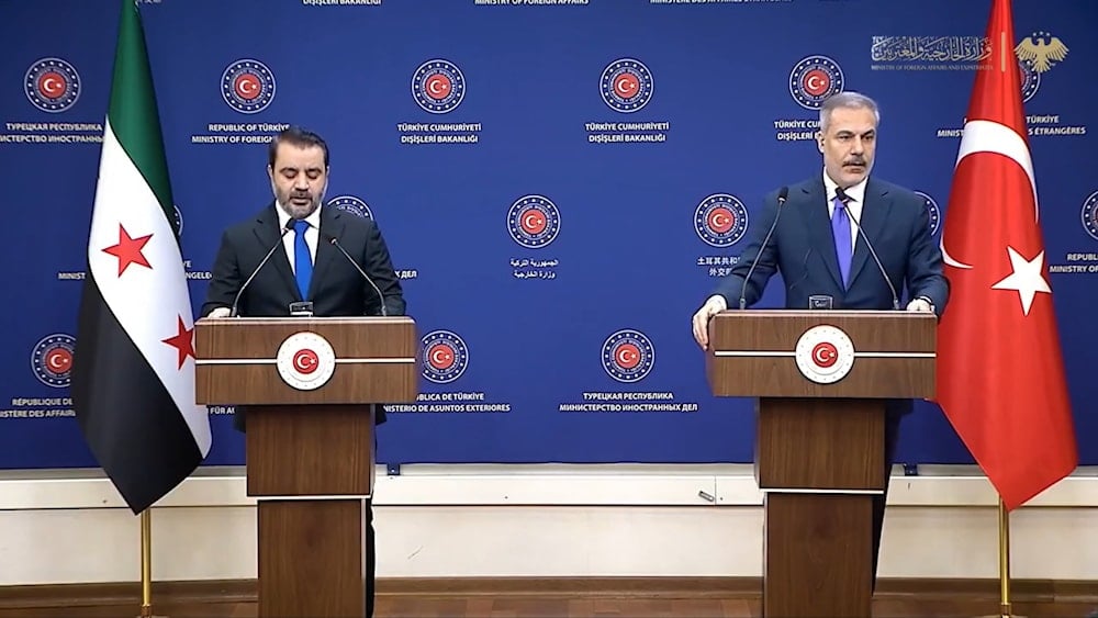 Turkish Foreign Minister Hakan Fidan and his syrian counterpart Hasan Al-Shaibani hold a press conference in Ankara, Turkey, August 13, 2025. (Screengrab)