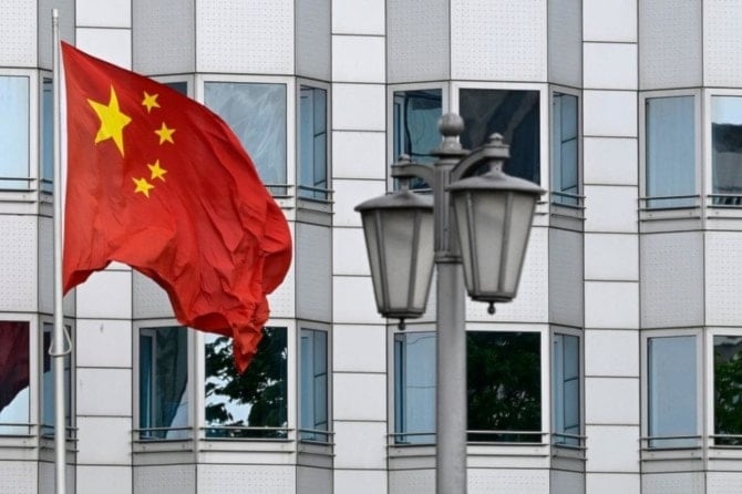 The Chinese flag is pictured in front of the façade of the Chinese embassy in Berlin on April 22, 2024. (AFP)