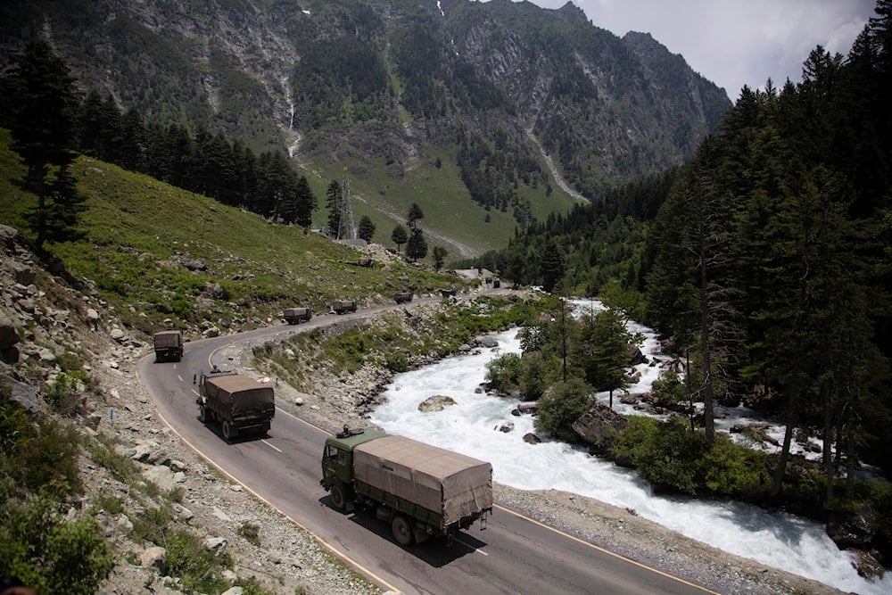 An Indian army convoy moves on the Srinagar- Ladakh highway at Gagangeer, north-east of Srinagar, India, Wednesday, June 17, 2020. (AP)