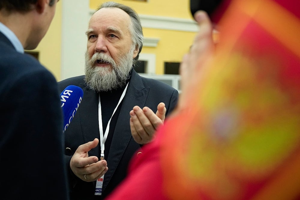 Political scientist Alexander Dugin, leader of the International Eurasian Movement, addresses journalists before the Founding Congress of the International Russophile Movement at Moscow's Pushkin State Museum of Fine Arts on March 14, 2023 (AP)
