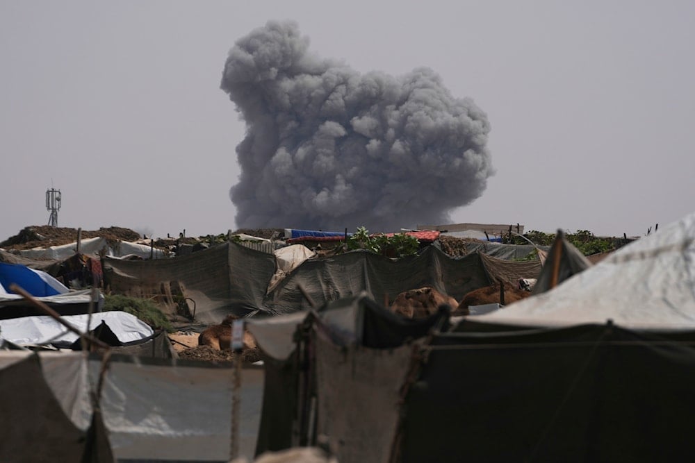 Smoke rises from an Israeli army airstrike east of Khan Younis, central Gaza Strip, Occupied Palestine Wednesday, Aug. 13, 2025 (AP)