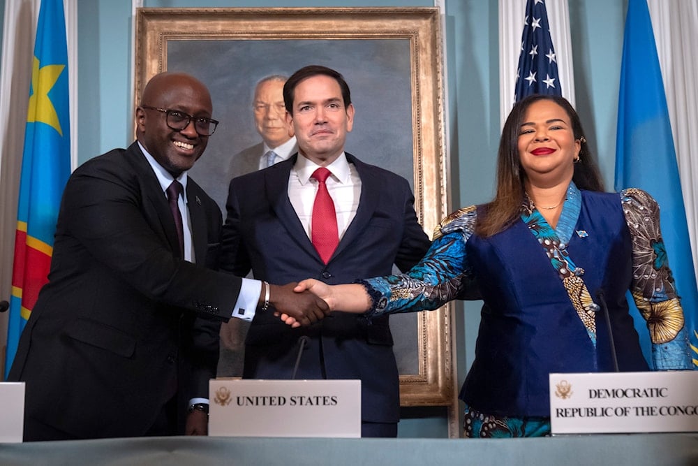 US State Secretary Rubio observes as Rwandan FM Nduhungirehe and DR Congo’s FM Wagner shake hands after signing a peace deal at the US State Department, Washington, United States June 2025