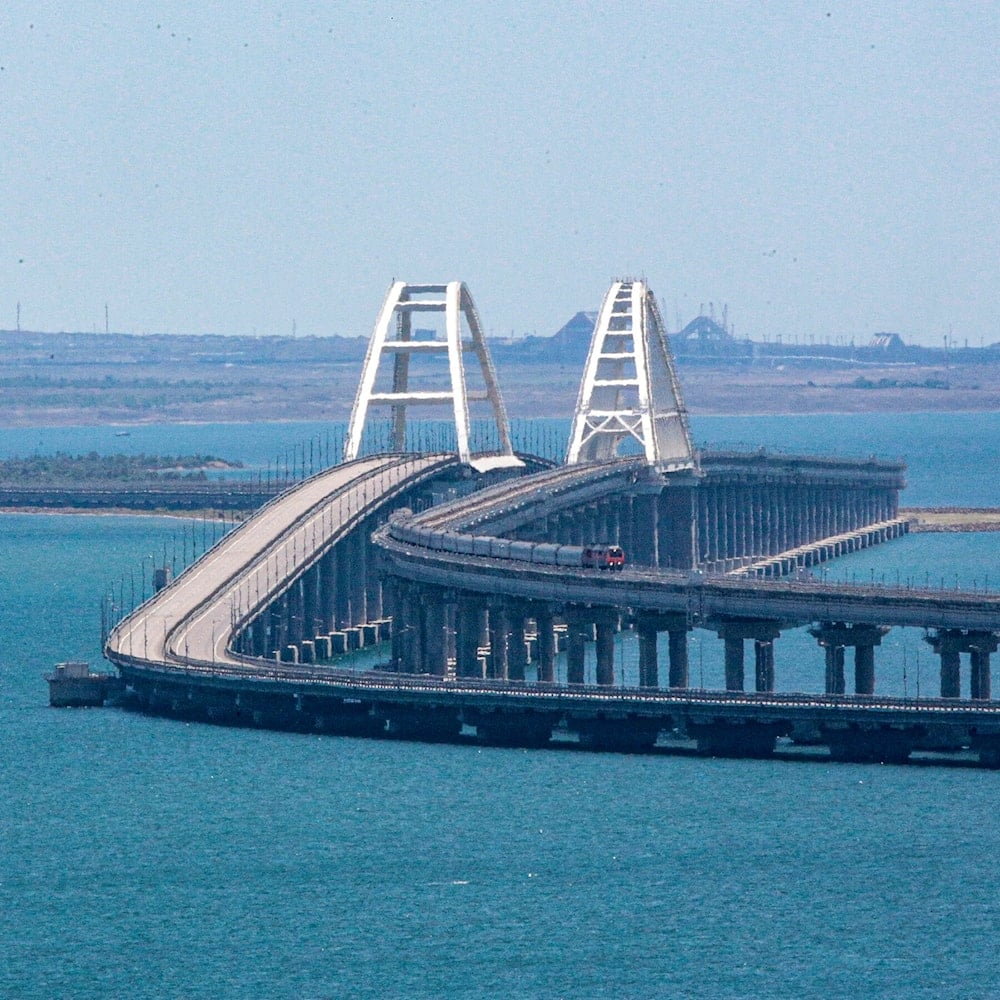 The Kerch Strait Bridge, connecting the Russian mainland and Crimean peninsula, in 2023. Ukraine first attacked it the previous October, with a truck bomb. (Associated Press)