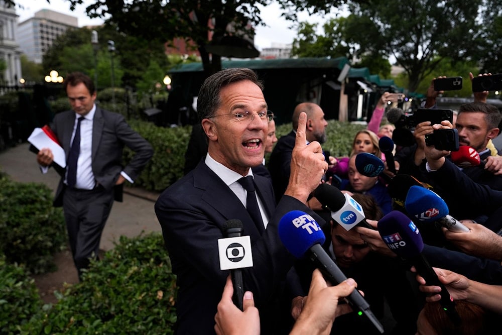 NATO Secretary General Mark Rutte speaks with reporters at the White House, on August 18, 2025, in Washington. (AP Photo/Julia Demaree Nikhinson)