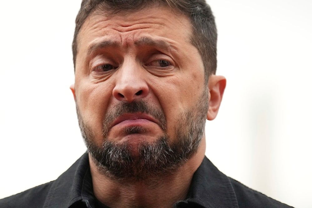 Ukraine's President Volodymyr Zelensky speaks in Lafayette Park, across from the White House, after meeting with President Donald Trump and European leaders Monday, August 18, 2025, in Washington (AP)