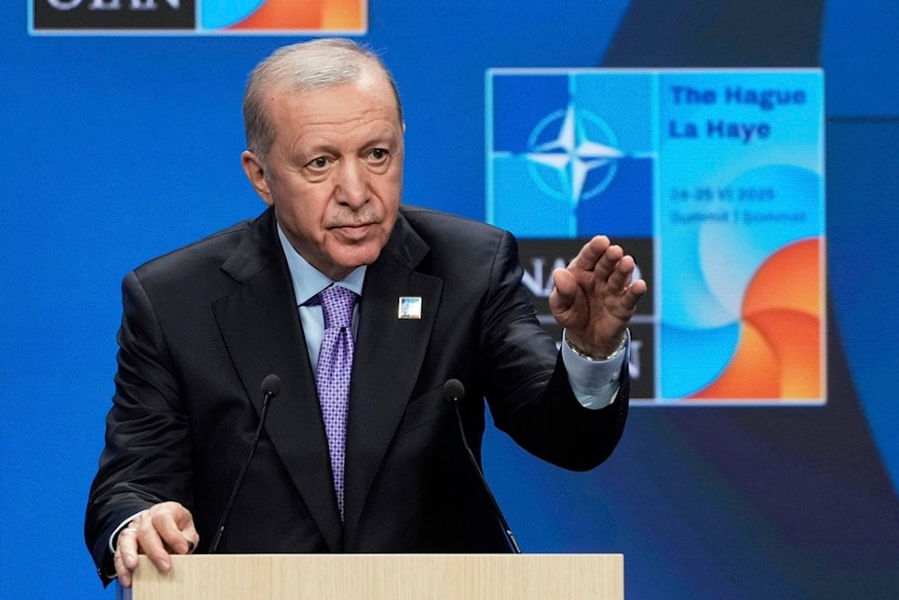 Turkish President Recep Tayyip Erdogan gestures during a press conference after the plenary session at the NATO summit in The Hague, Netherlands, Wednesday, June 25, 2025 (AP)