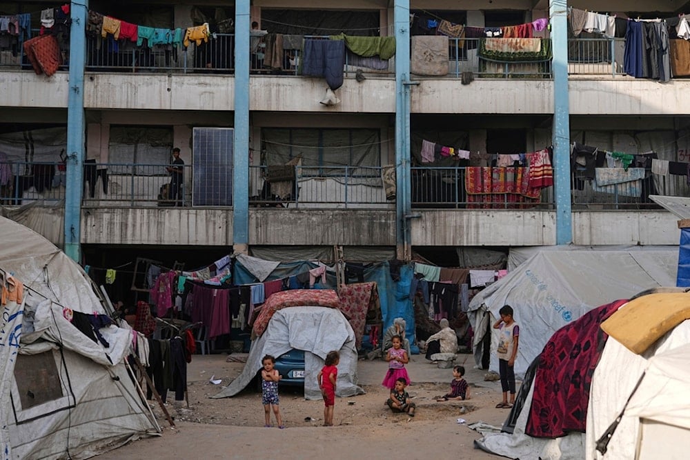 Displaced Palestinians live in a school run by UNRWA, the UN agency, in Gaza City, Monday, June 23, 2025 (AP)
