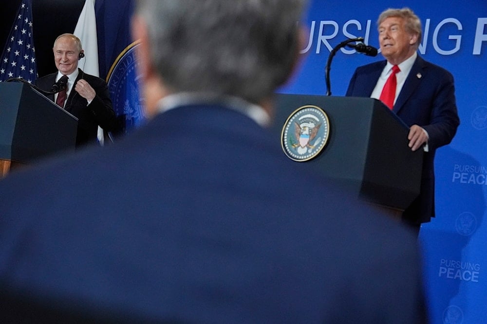 President Donald Trump and Russia's President Vladimir Putin speak during a news conference at Joint Base Elmendorf-Richardson, Alaska, Friday, August 15, 2025 (AP)  