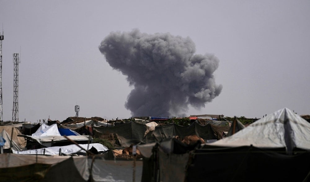 Smoke rises from an Israeli airstrike east of Khan Younis, central Gaza Strip, Wednesday, Aug. 13, 2025. (AP)