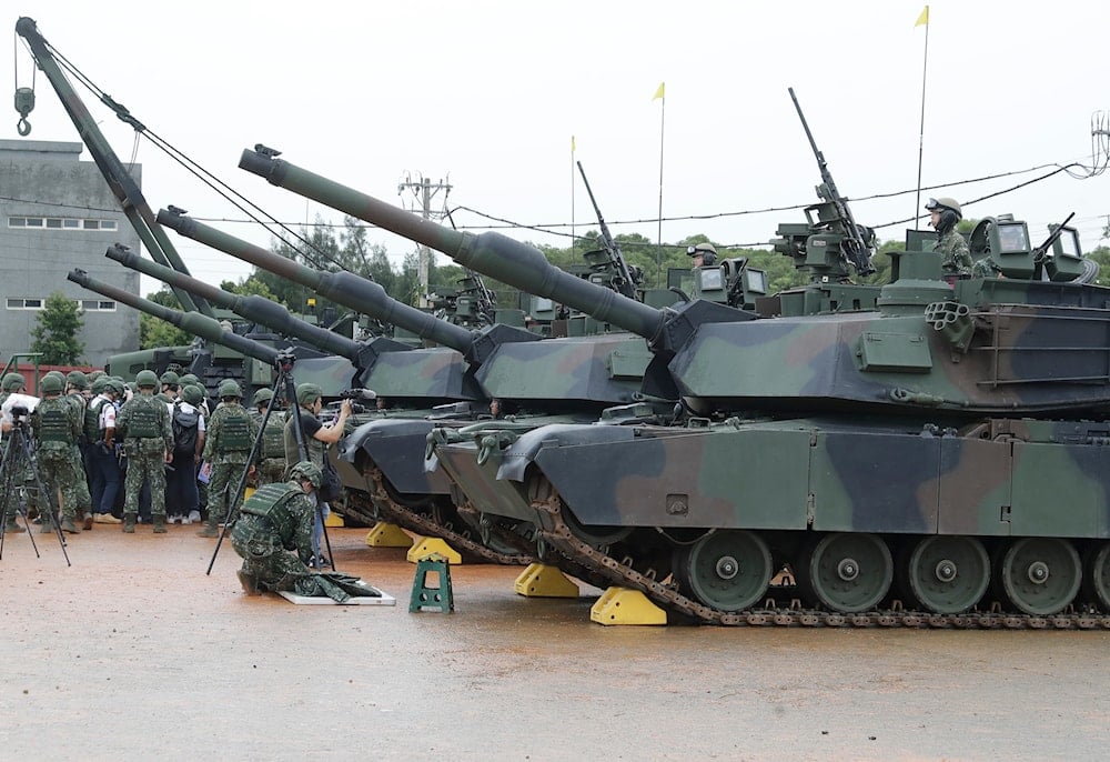 M1A2T Abrams main battle tanks are prepared for a military live-fire shooting training in Hsinchu County, Taiwan, Thursday, July 10, 2025 (AP)