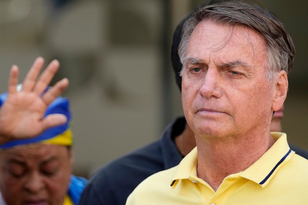 Brazil’s former President Jair Bolsonaro, temporarily allowed out of house arrest for medical exams, leaves a hospital in Brasília, Brazil, Saturday, Aug. 16, 2025 (AP)
