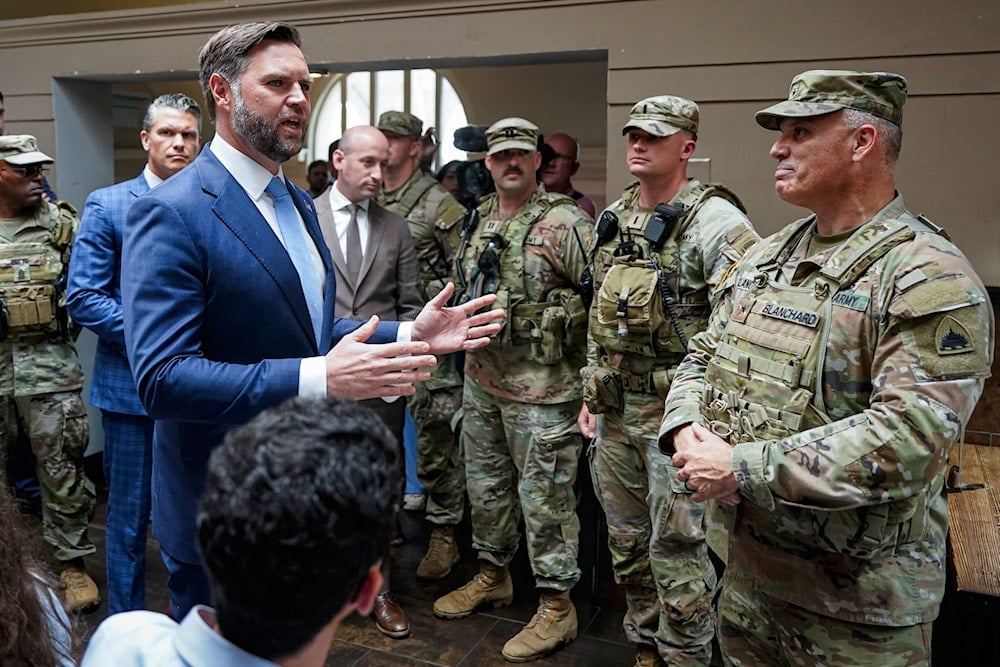 Vice President JD Vance speaks with members of the National Guard at Union Station in Washington, Wednesday, Aug. 20, 2025 (AP)