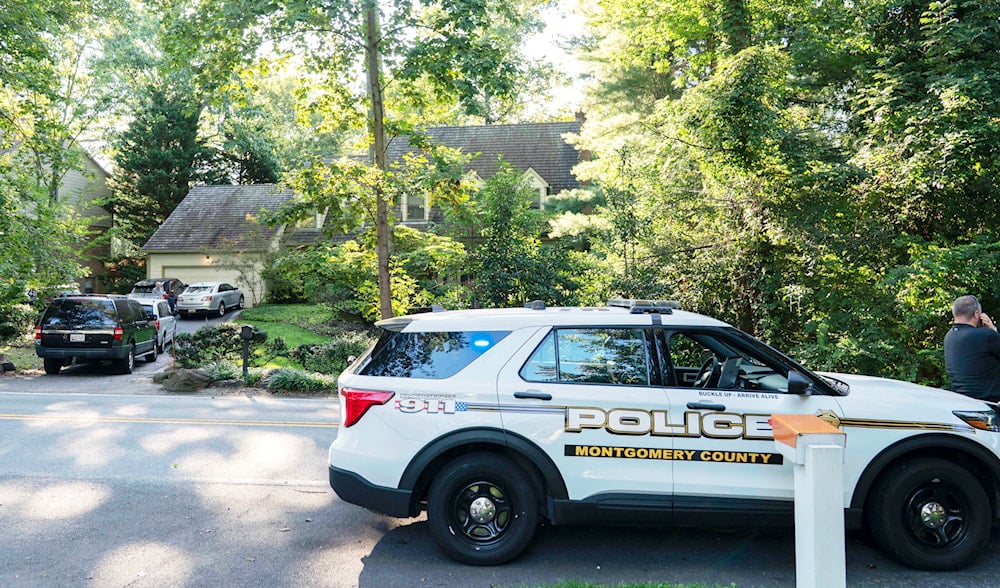 Former National Security Advisor John Bolton's house is seen with a Montgomery County, Md., police vehicle outside, as FBI agents search the home, Friday, Aug. 22, 2025 in Bethesda, Md. (AP)