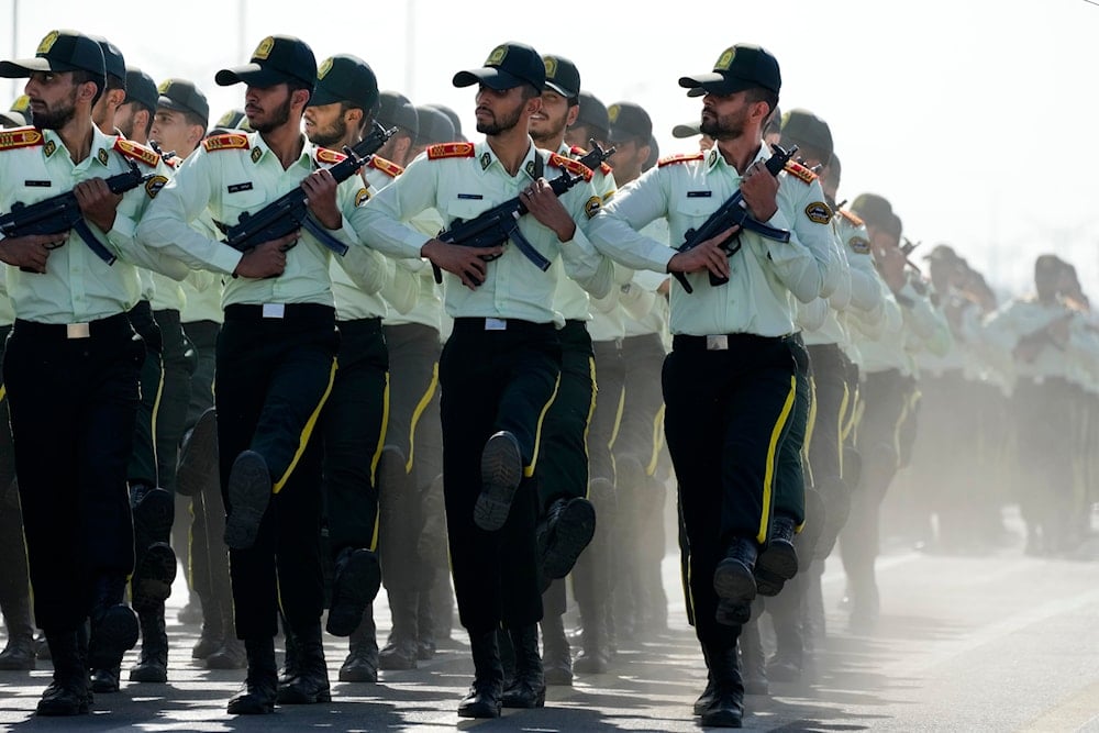Iranian police cadets march in front of the shrine of the late revolutionary founder Ayatollah Khomeini, just outside Tehran, Iran, Friday, Sept. 22, 2023 (AP)