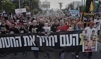 Israeli protesters call for ceasefire deal, heckle Ben-Gvir