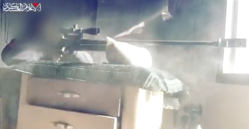A scene showing an al-Qassam Brigades fighter during an ambush on July 7, 2025, in a video released by the al-Qassam Brigades on August 26, 2025 (al-Qassam Brigades Military Media)