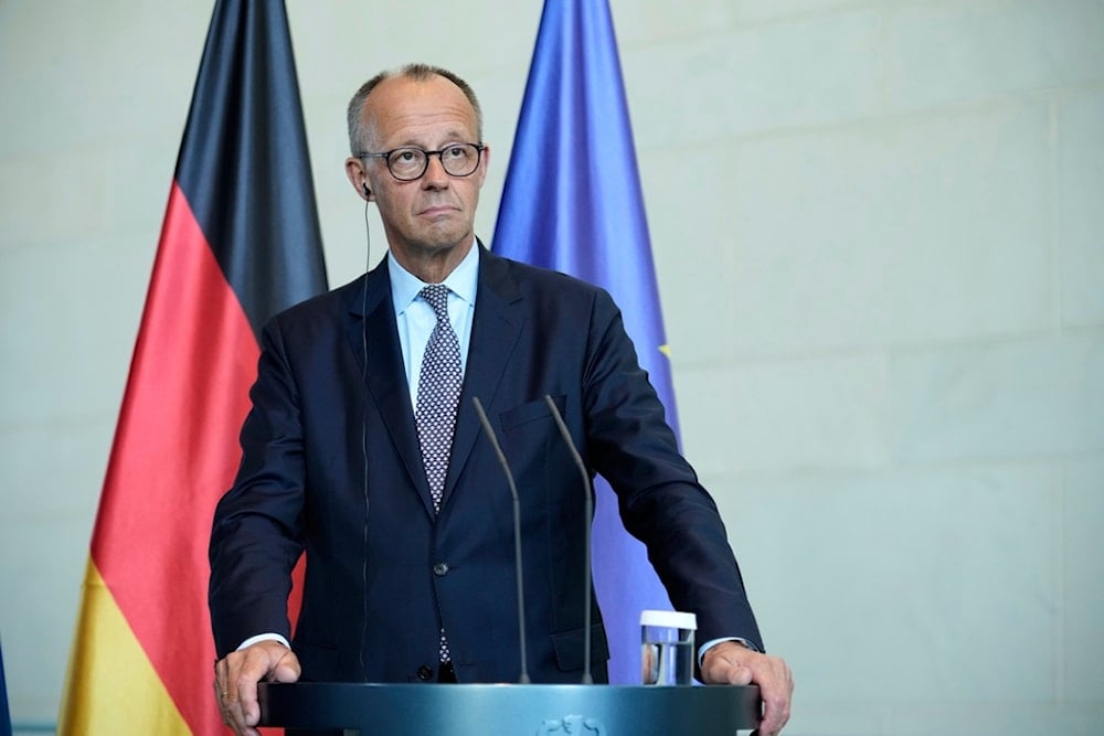 German Chancellor Friedrich Merz attends a joint press statement with Ukrainian President Volodymyr Zelenskyy following talks with European and U.S. leaders in Berlin, Germany, Wednesday, Aug. 13, 2025. (AP Photo/Ebrahim Noroozi)