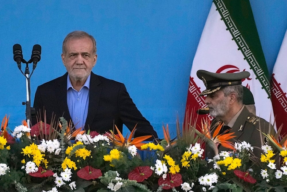 Iranian President Masoud Pezeshkian and army commander Gen. Abdolrahim Mousavi during an annual armed forces parade in front of the shrine of revolutionary founder Ayatollah Khomeini, just outside Tehran, Iran, Saturday, September 21, 2024 (AP)