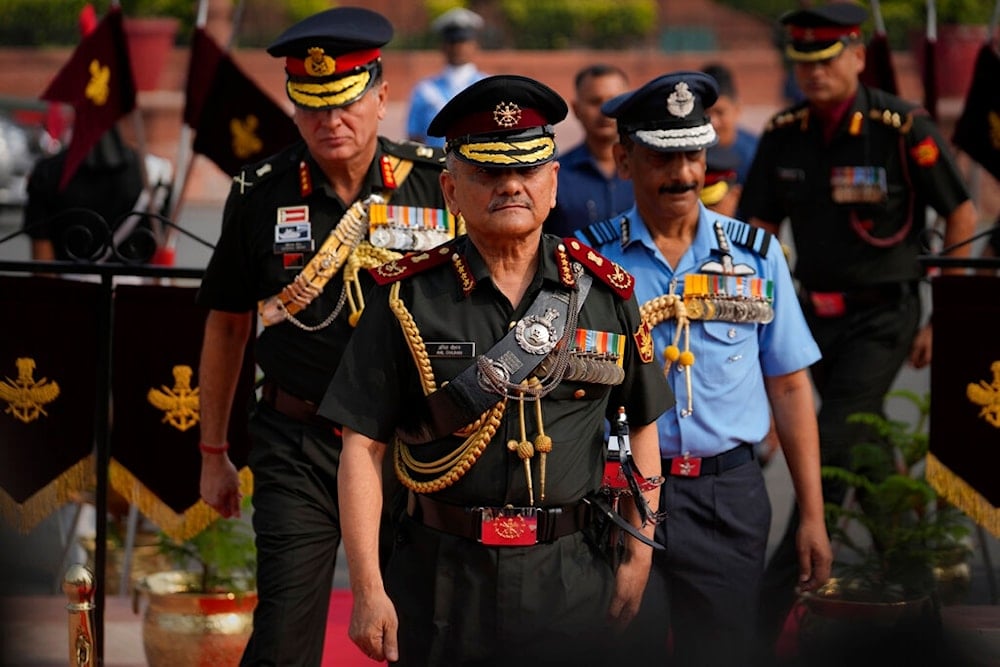 Newly appointed Chief of Defense Staff (CDS) Lt. General Anil Chauhan arrives for a joint military guard of honor after assuming office in New Delhi, India, Friday, Sept. 30, 2022. (AP Photo/Altaf Qadri)