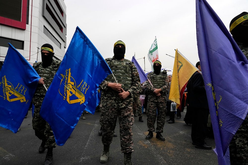 Member of the Iranian Basij paramilitary force attend the annual anti-Israeli Quds Day in support of Palestinians, in Tehran, Iran, Friday, March 28, 2025 (AP)