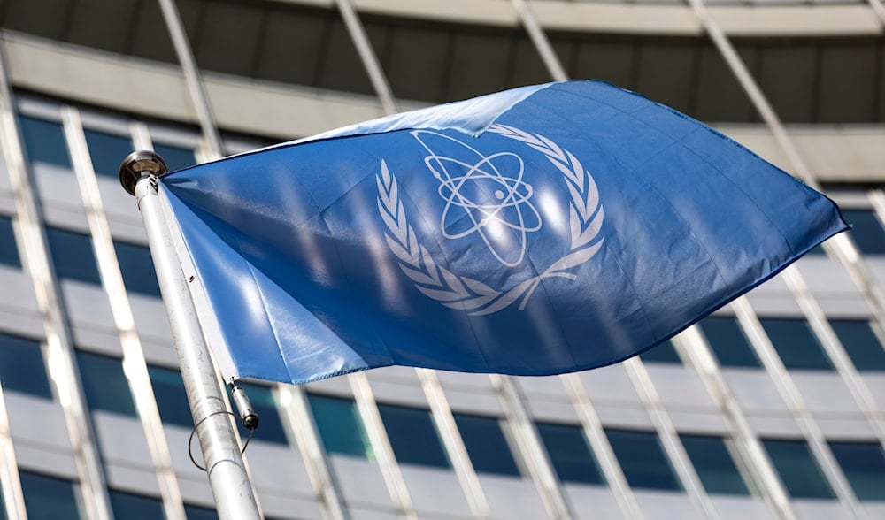 In this June 7, 2021, file photo, the flag of the International Atomic Energy Agency (IAEA) waves at the entrance of the Vienna International Center in Vienna. (AP)