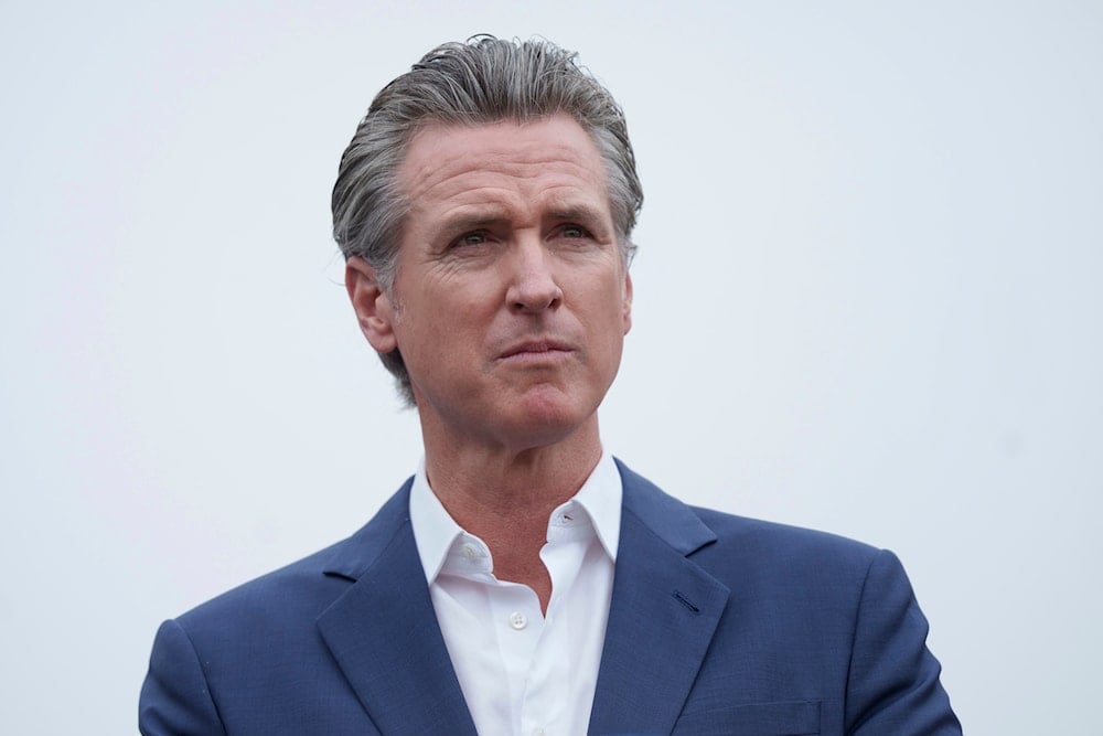 Newsom warns Trump threatens democracy, hints at third-term ambition