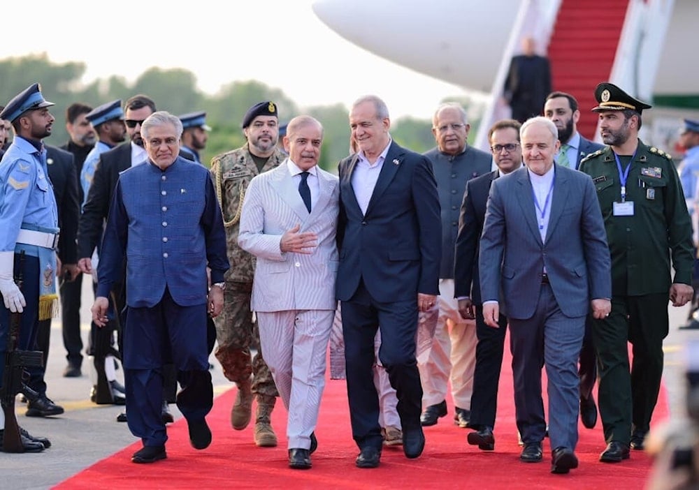 Iranian President Masoud Pezeshkian walks alongside Pakistan's Prime Minister Shehbaz Sharif, Lahore, Pakistan, August 3, 2025 (X/ @CMShehbaz)