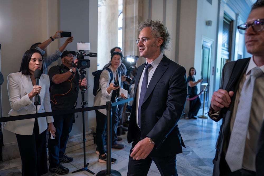 Alex Karp, CEO of the software firm Palantir Technologies, arrives as then Senate Majority Leader Chuck Schumer, convenes a closed-door gathering of leading tech CEOs, Wednesday, Sept. 13, 2023 (AP)