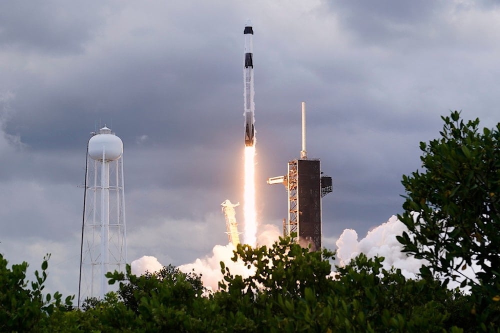 A SpaceX Falcon 9 rocket with a Crew Dragon capsule lifts off from Pad 39-A at the Kennedy Space Center, Friday, Aug. 1, 2025, in Cape Canaveral, Fla. (AP Photo/John Raoux)