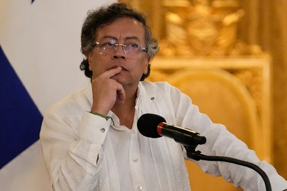 Colombia's President Gustavo Petro attends a joint press conference with the Panamanian president, at the presidential palace in Panama City, Friday, March 28, 2025. (AP Photo/Matias Delacroix)