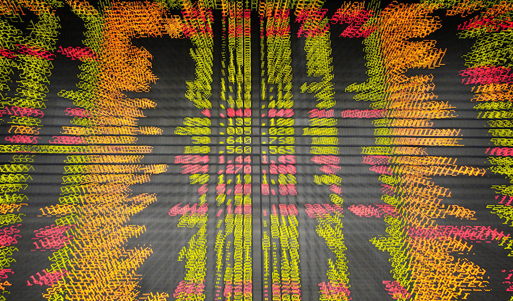 An electronic board displays stock prices at a private stock market gallery in Kuala Lumpur, Malaysia, Friday, Nov. 30, 2018. (AP)