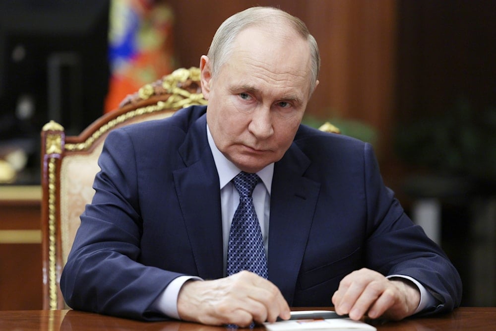 Russian President Vladimir Putin speaks with Igor Shuvalov, the chairman of the Russian state development corporation VEB.RF, during their meeting at the Kremlin in Moscow, Russia, Tuesday, Aug. 5, 2025 (AP)
