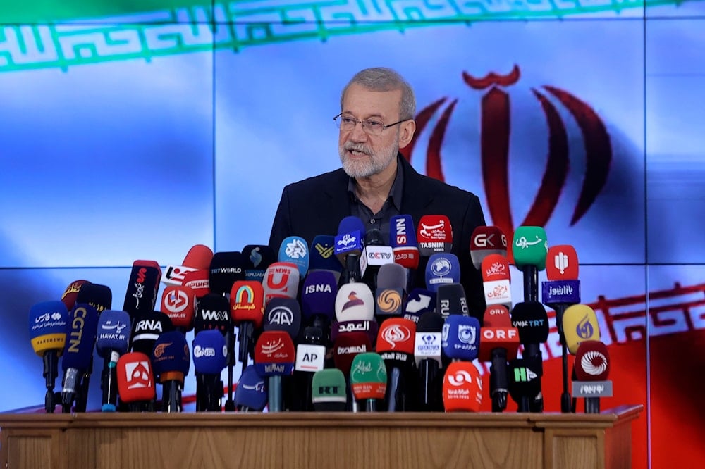 Former Iran's parliament speaker Ali Larijani speaks with media after registering his name as a candidate for the June 28 presidential elections at the Interior Ministry in Tehran, Iran, Friday, May 31, 2024 (AP)