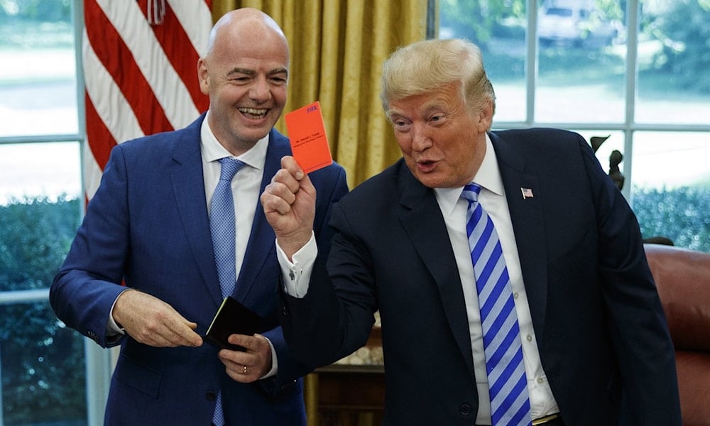 Gianni Infantino, pictured on a visit to the Oval Office in 2018, also attended Donald Trump’s inauguration in January. (Evan Vucci/AP)