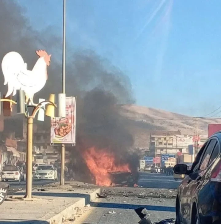 A vehicle is on fire after an Israeli drone strike targeted it near the Syrian-Lebanese border crossing area of Masnaa, August 7, 2025 (Social media)