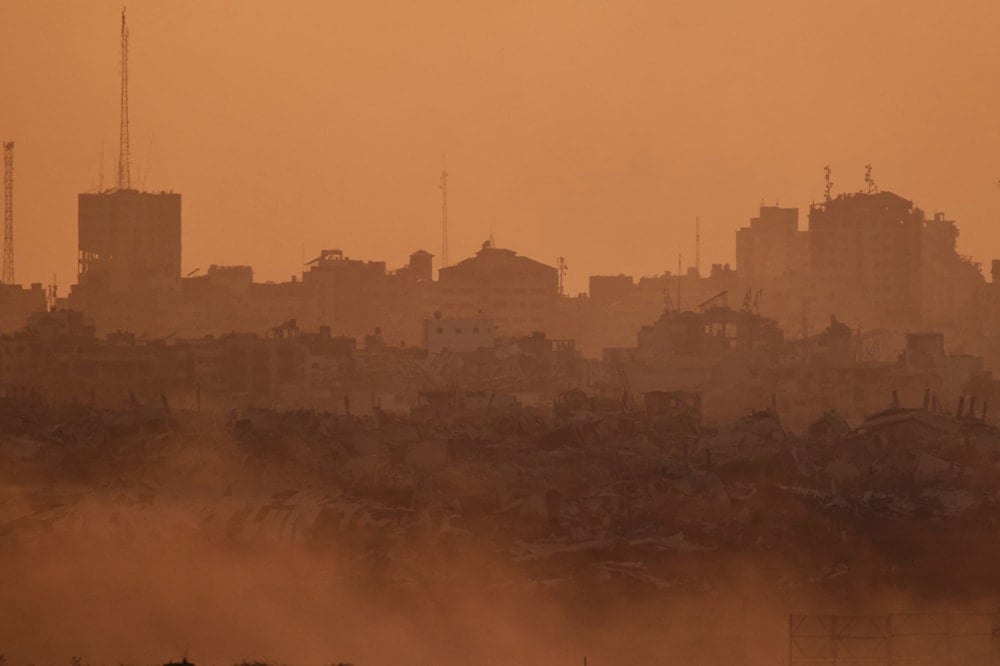 Buildings that were destroyed during the Israeli ground and air operations stand in the Gaza Strip as seen from southern occupied Palestine, on August 7, 2025. (AP Photo/Leo Correa)