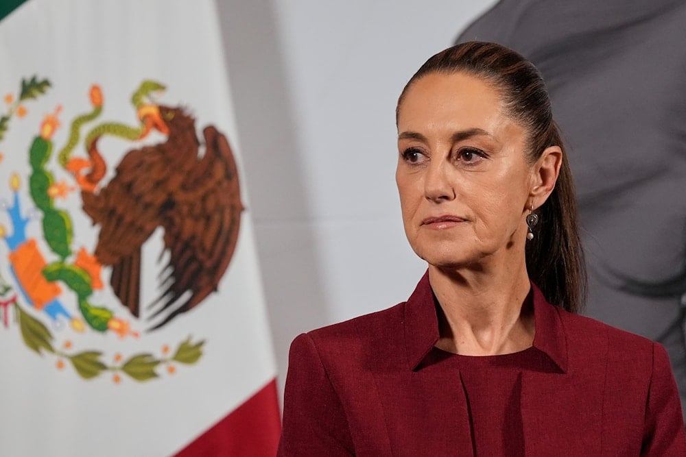 Mexican President Claudia Sheinbaum attends her morning press conference at the National Palace in Mexico City, April 2, 2025 (AP)