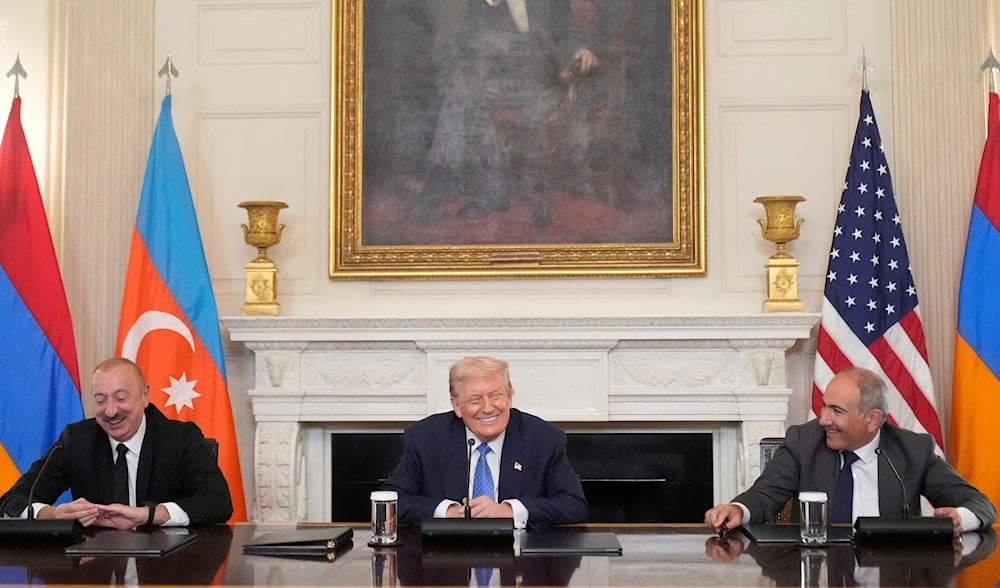 President Donald Trump, joined by Armenian Prime Minister Nikol Pashinyan, right, and Azerbaijan President Ilham Aliyev, speaks during a trilateral signing ceremony in the State Dining Room of the White House, Aug. 8, 2025. (AP)