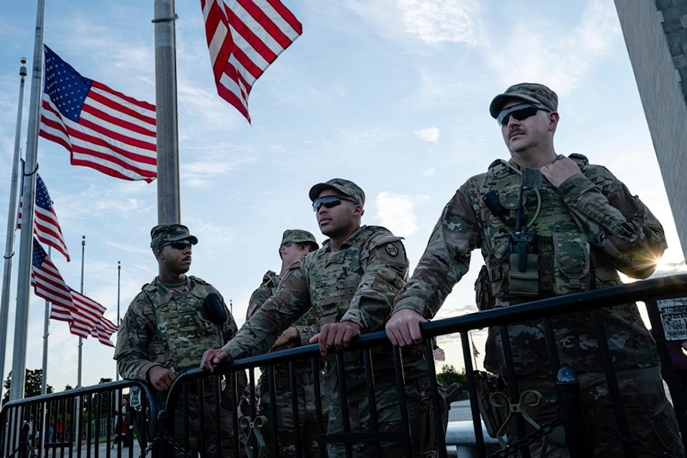 Members of the South Carolina National Guard gather at the Washington Monument, Sunday, August 31, 2025, in Washington. (AP)