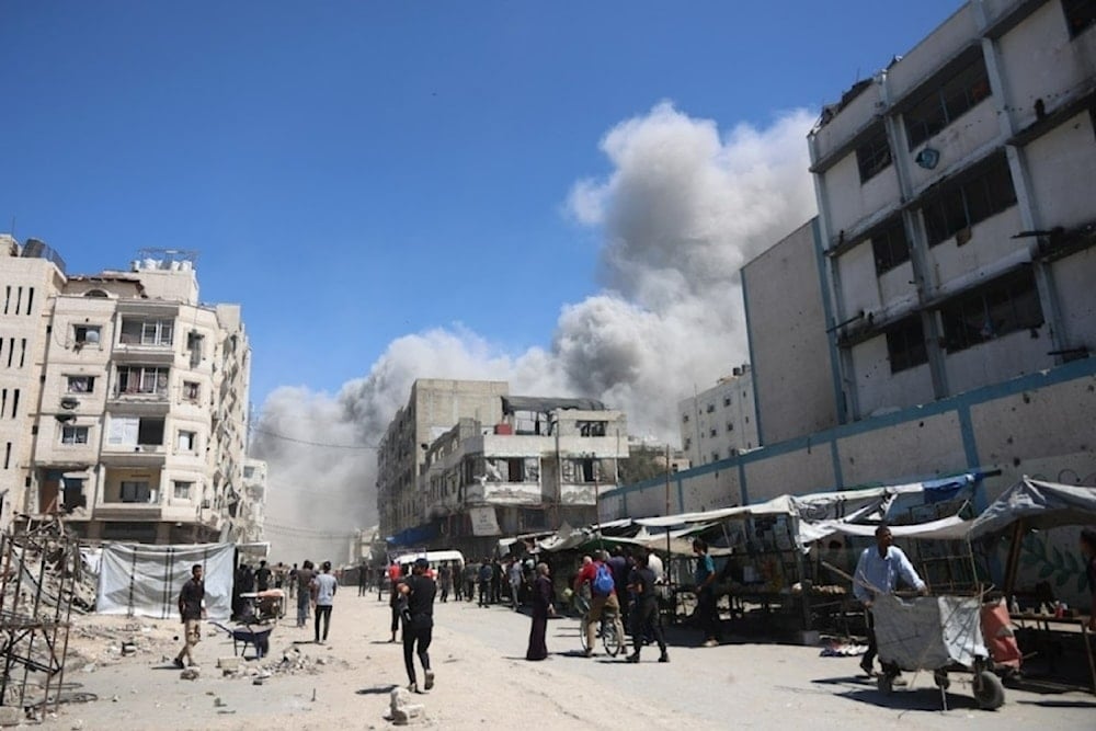 Smoke rises following an Israeli airstrike on Nasser Street in Gaza City, September 12, 2025. (AFP)