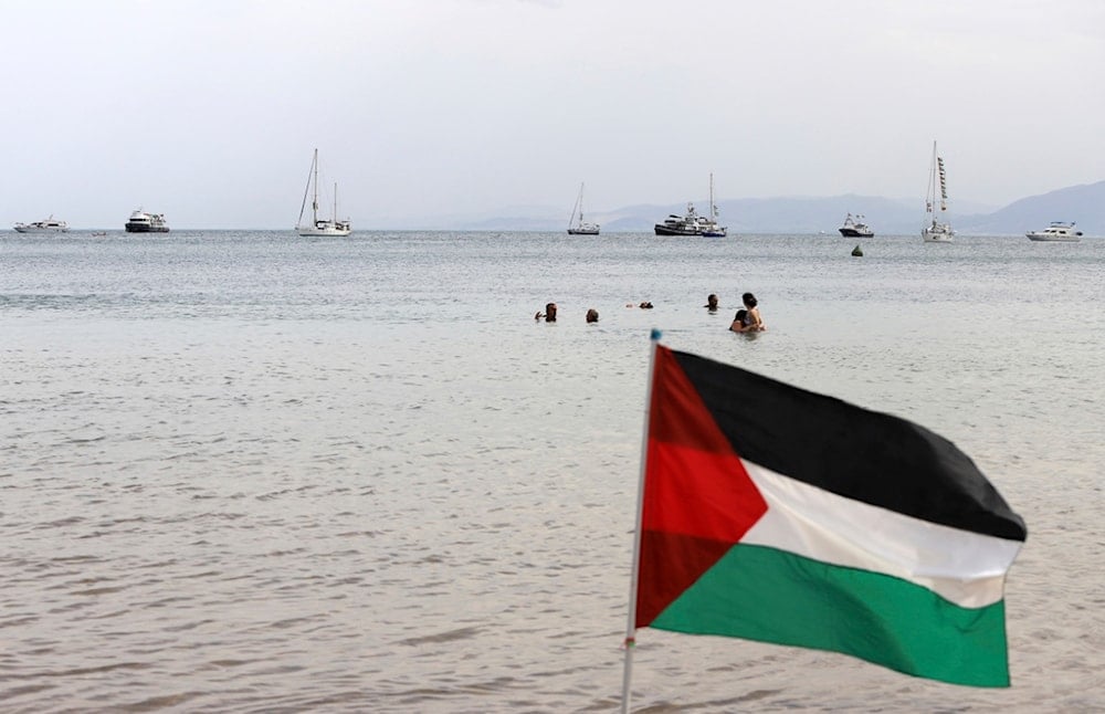 Ships that are part of the Global Sumud Flotilla heading to Gaza are anchored off the coast of of Sidi Bou Saïd in Tunis, Tunisia, Tuesday, Sept. 9, 2025. (AP Photo/Anis Mili)