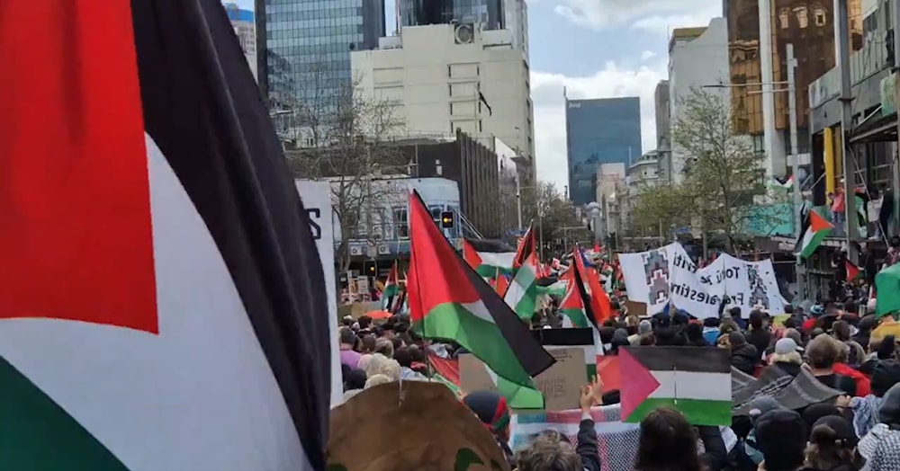 Screencap of video documenting pro-Palestine protesters marching through Auckland on September 13, 2025 (@KiwiCraig74 on X)