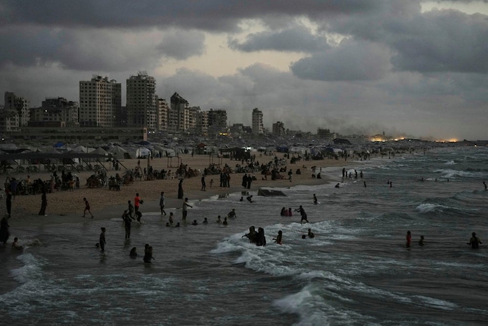 Displaced Palestinians in the Mediterranean Sea near the port of Gaza City, Tuesday, September 2, 2025 (AP)