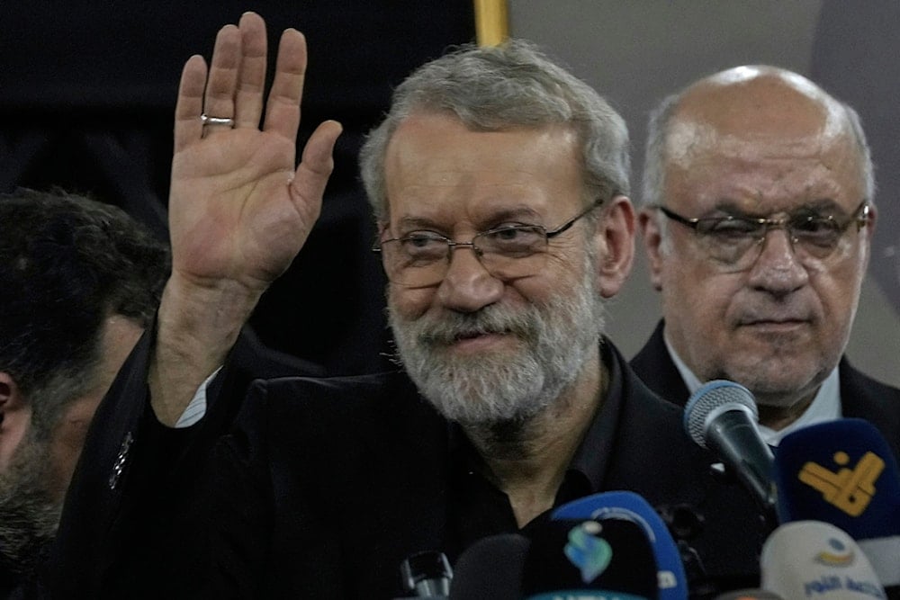 Iranian Secretary of Supreme National Security Council Ali Larijani, waves as he leaves the grave of former Hezbollah Secretary-General Sayyed Hassan Nasrallah, in Beirut, Lebanon, Wednesday, August 13, 2025 (AP)